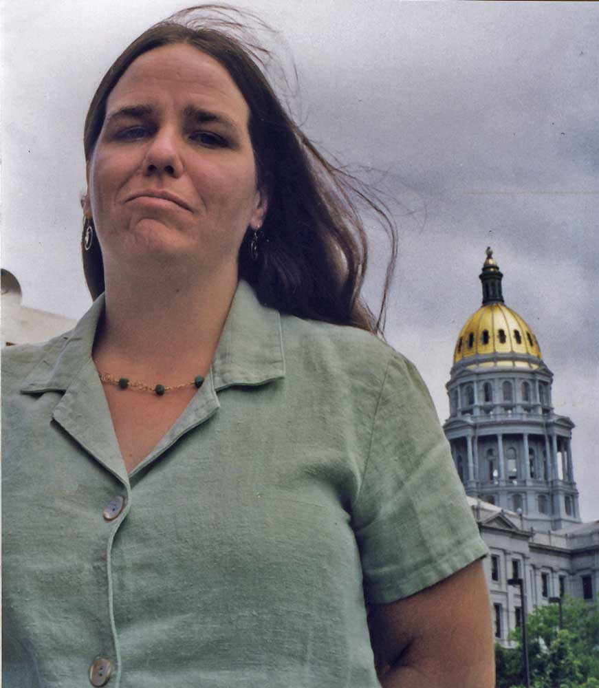 Activist Laura Kriho in front of Colorado's state capital building 