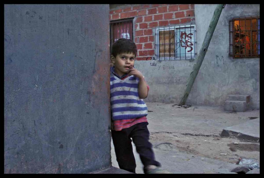 a little boy in a slum of Buenos Aires